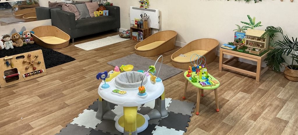 Baby sleeping beds and baby bouncer at Partou Acorns in Adel nursery and pre-school in Leeds
