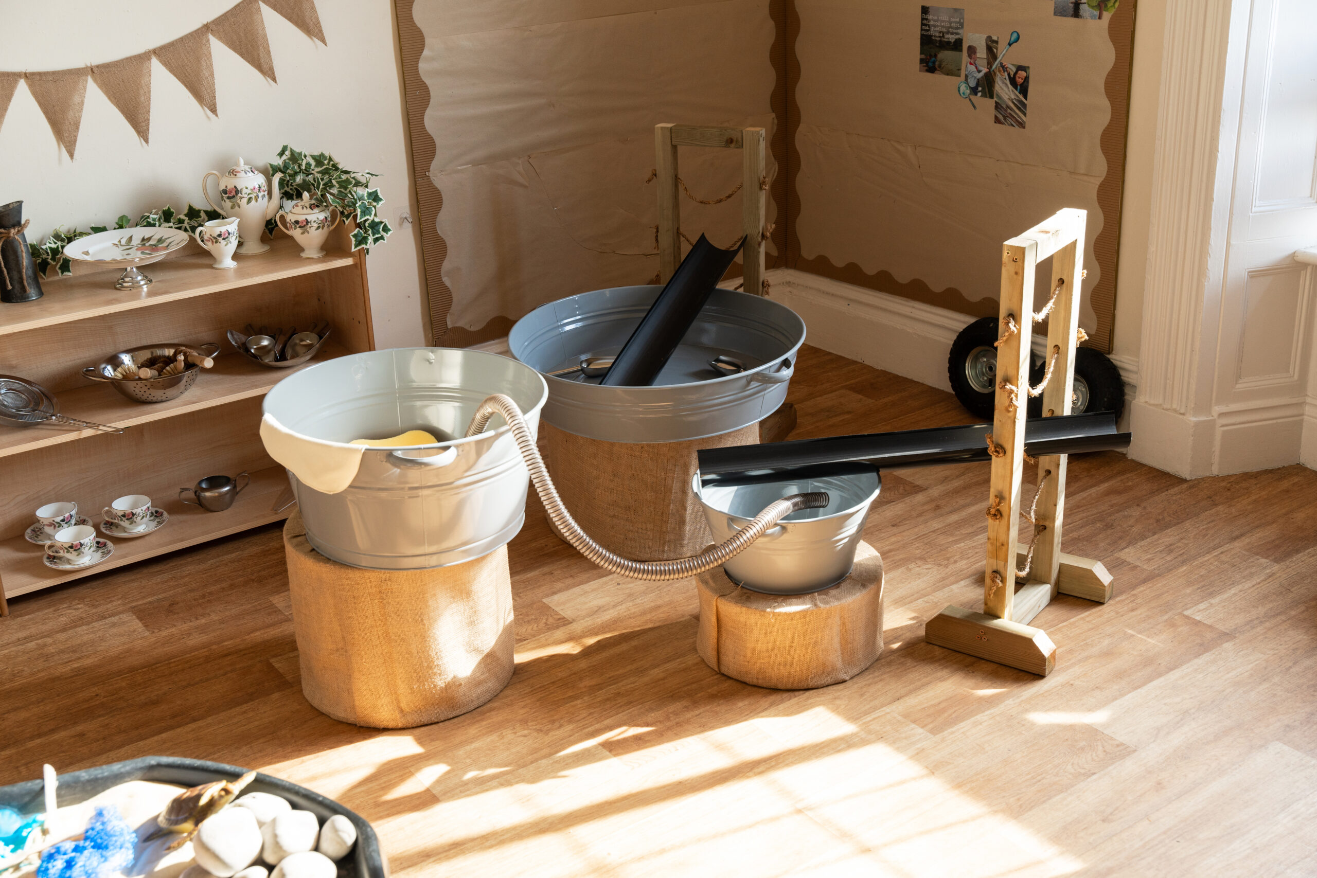 Indoor water play zone at Hilltops nursery in Chorley