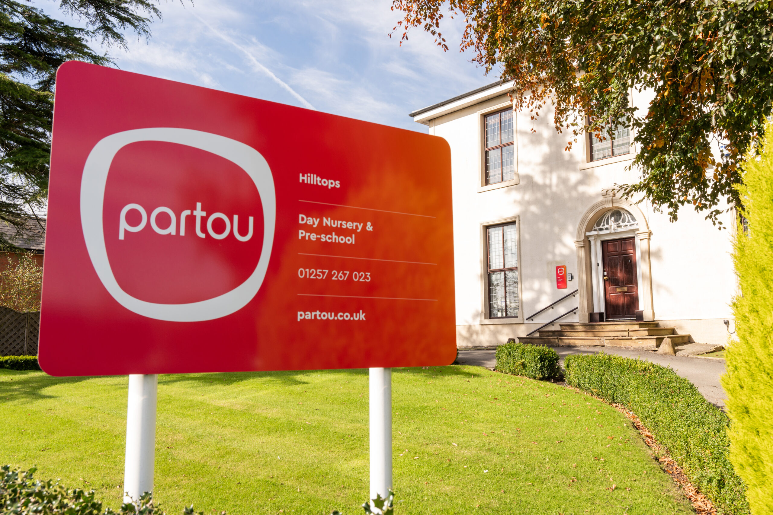 Hilltops nursery and pre-school building with Partou signage