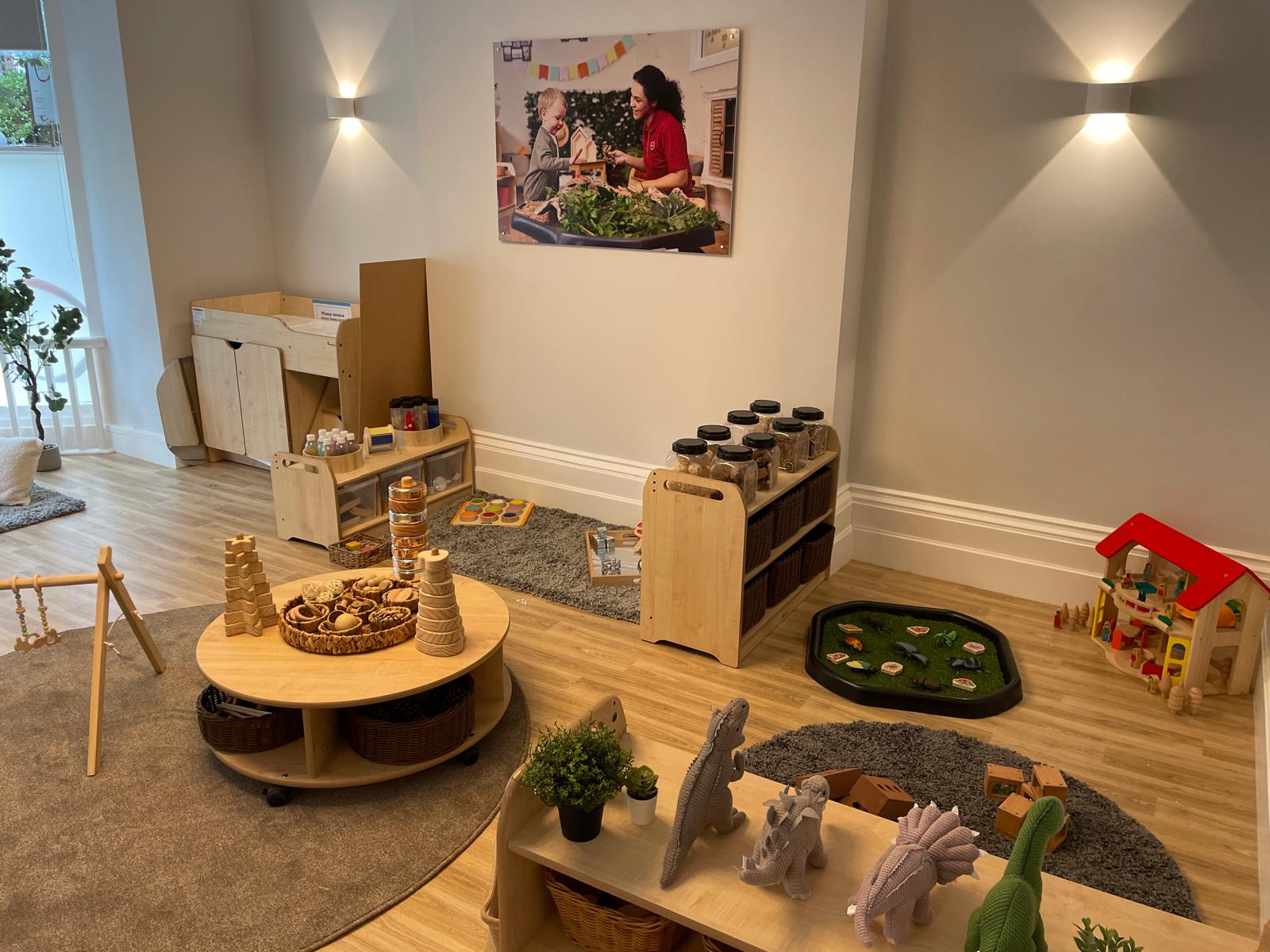 Dinosaurs and play house in the Oxton Day nursery in Birkenhead