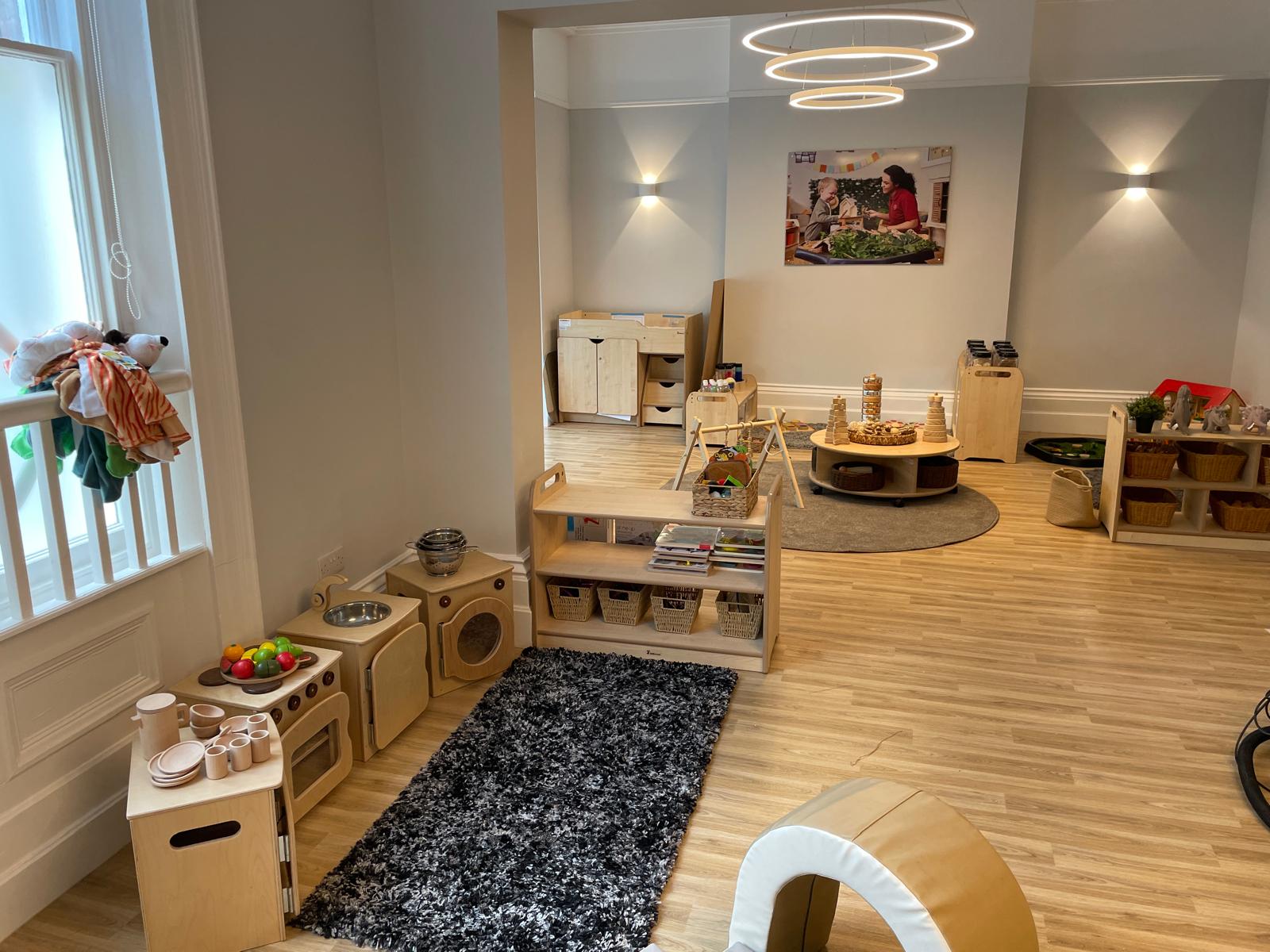 Play kitchen area in toddler area at Oxton Day Nursery in Birkenhead