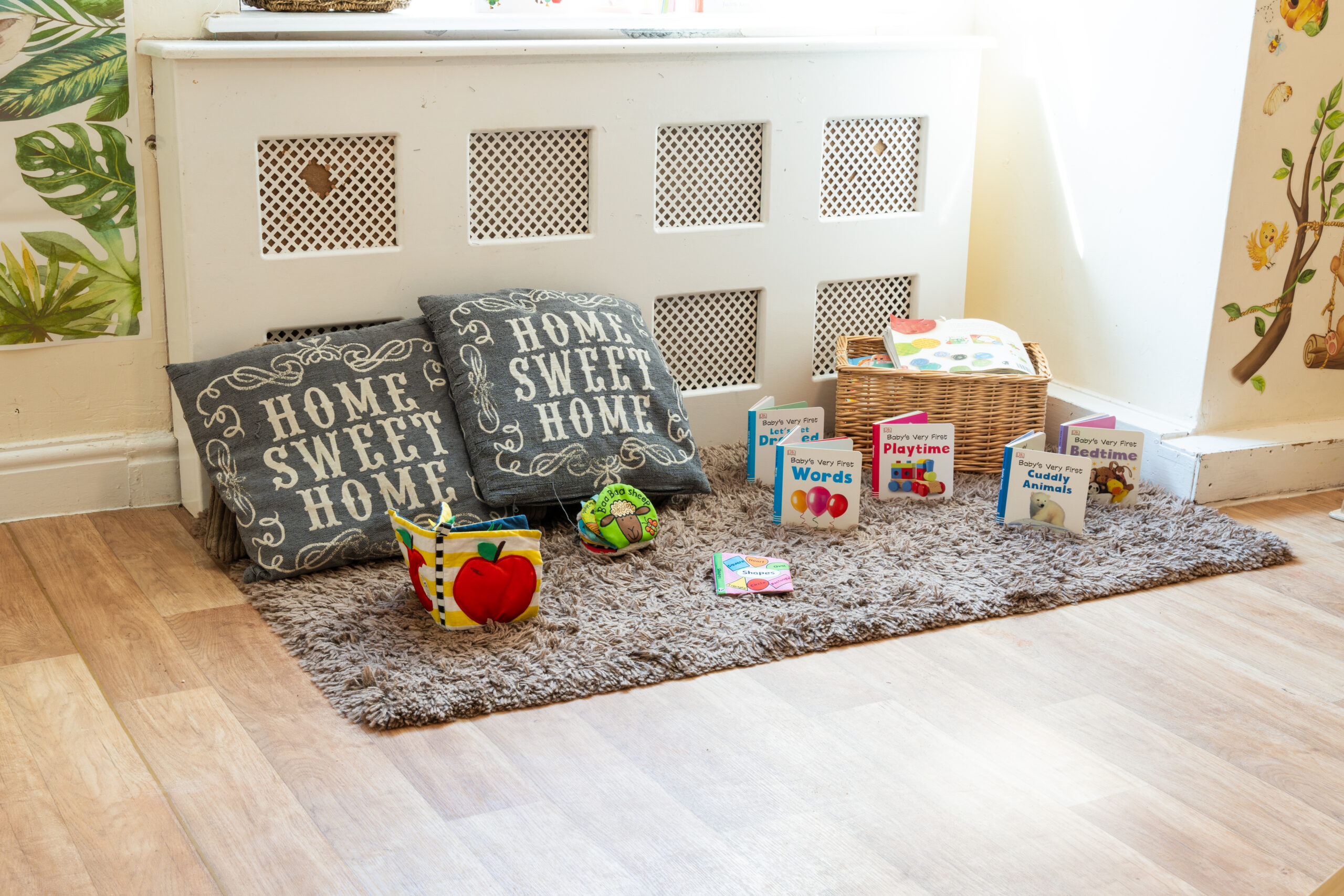 Relaxation corner at Safehands nursery in Harrogate with books and cushions