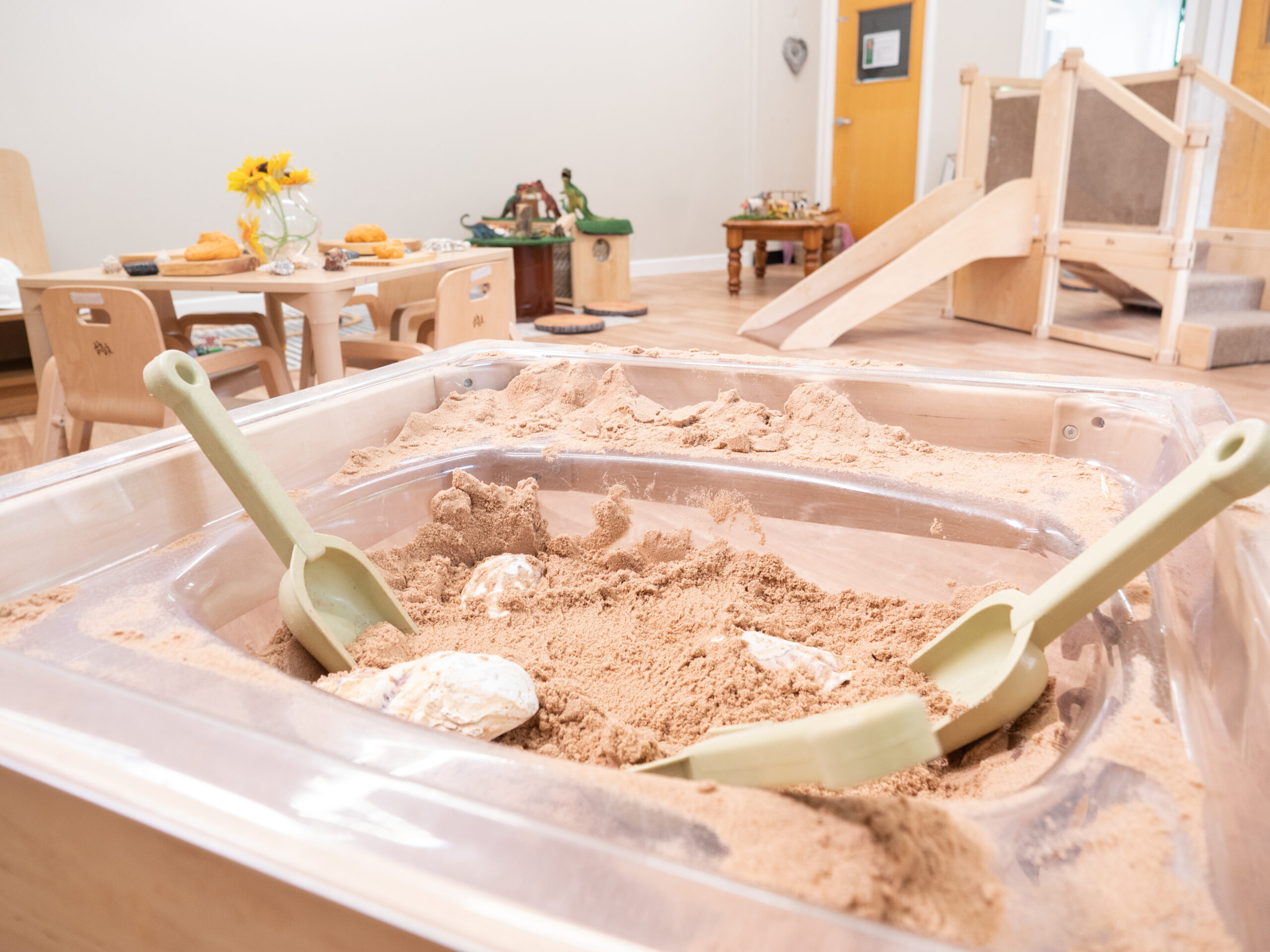 Sand pit in toddler room at Smileys nursery in Stafford