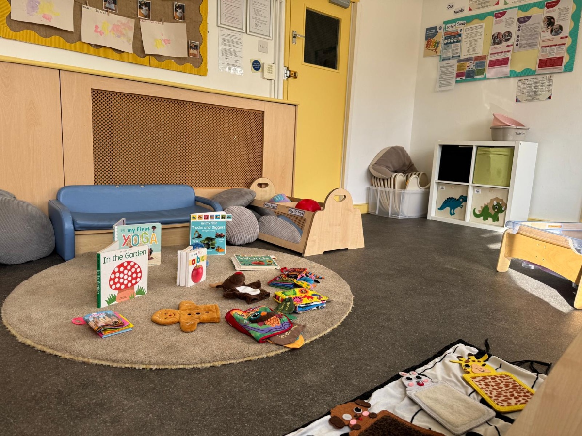 Bright early years reading and sensory play area at Partou Little Faces Day Nursery & Pre-School, featuring a blue children